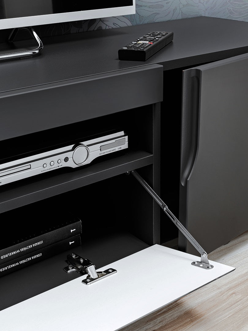 Sleek and contemporary, our Black Matt TV Unit combines modern design with functional storage. This floating TV stand effortlessly elevates your entertainment space, creating a minimalist and stylish focal point. The black matte finish adds a touch of sophistication, while the floating design enhances the illusion of space.
